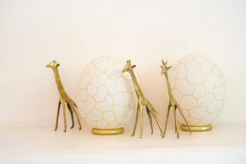 The Fine Giraffe Carved Ostrich Egg Ornament from Leo & Stripes