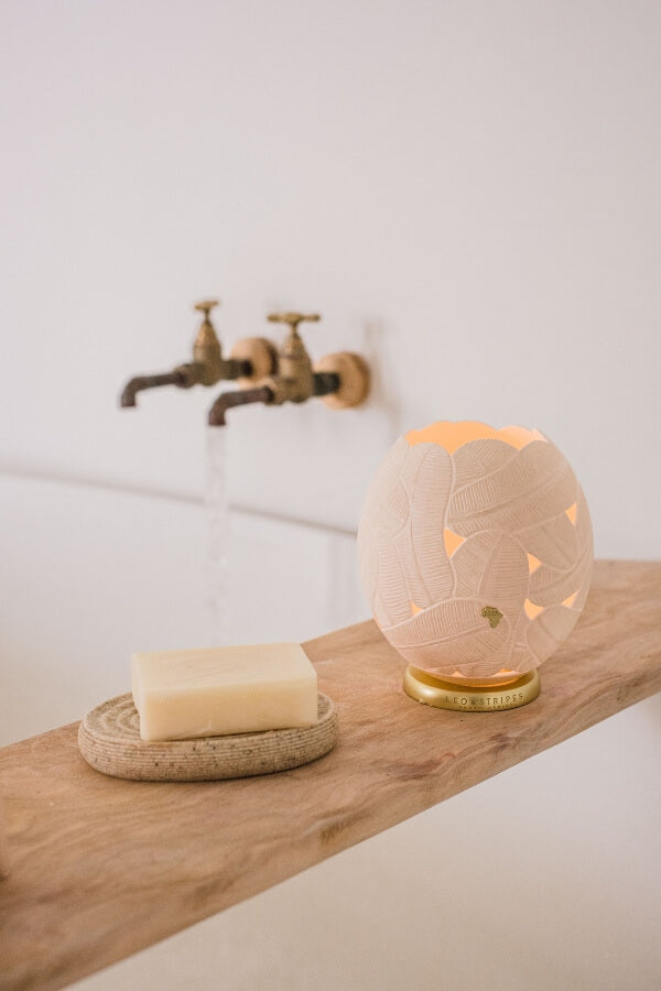 The Feathers Ostrich Egg Tealight Holder from Leo & Stripes