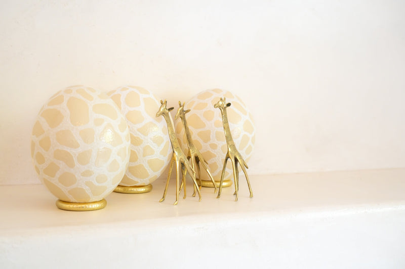 The Bold Giraffe Carved Ostrich Egg Ornament from Leo & Stripes