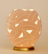 The Leaves Ostrich Egg Tealight Holder from Leo & Stripes