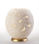 The Leaves Ostrich Egg Tealight Holder from Leo & Stripes