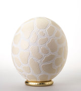 The Bold Giraffe Carved Ostrich Egg Ornament from Leo & Stripes