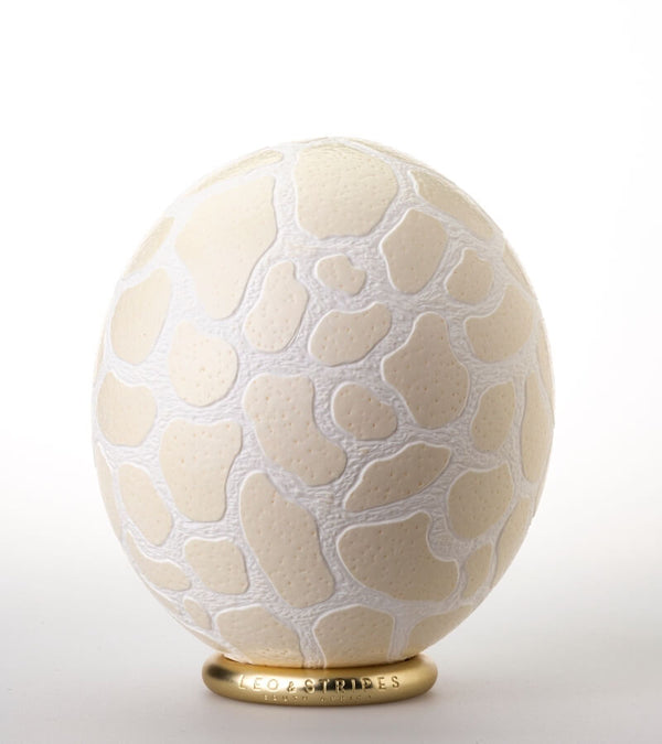 The Bold Giraffe Carved Ostrich Egg Ornament from Leo & Stripes