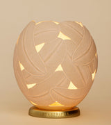 The Feathers Ostrich Egg Tealight Holder from Leo & Stripes