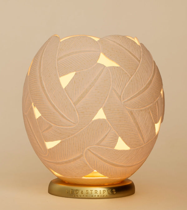 The Feathers Ostrich Egg Tealight Holder from Leo & Stripes