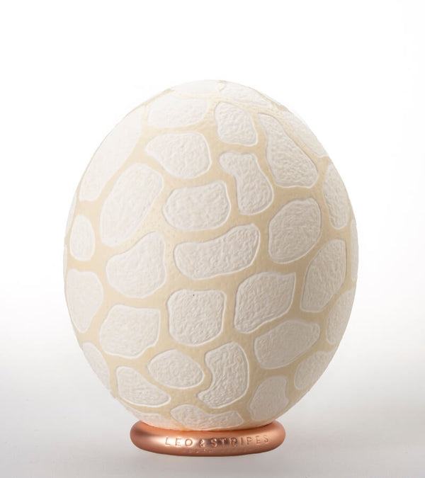 The Fine Giraffe Carved Ostrich Egg Ornament from Leo & Stripes