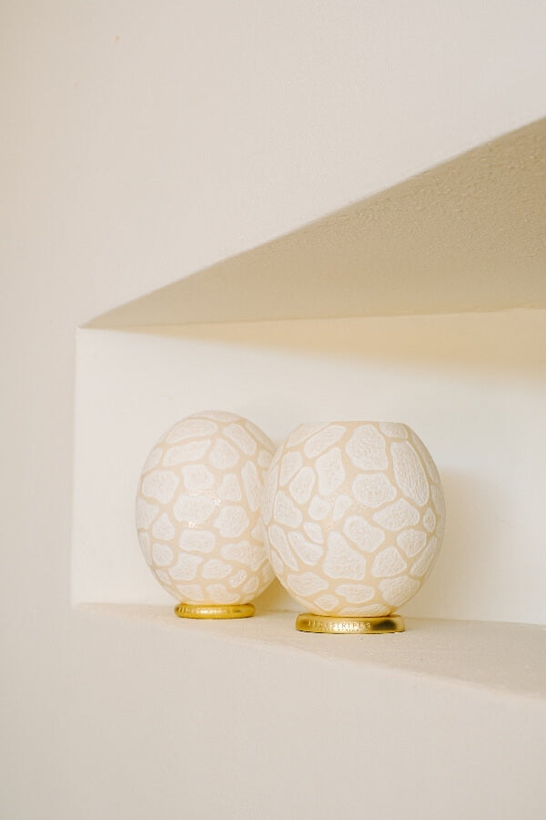 The Fine Giraffe Carved Ostrich Egg Ornament from Leo & Stripes