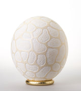 The Fine Giraffe Carved Ostrich Egg Ornament from Leo & Stripes