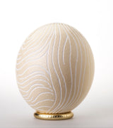 The Fine Zebra Carved Ostrich Egg Ornament from Leo & Stripes