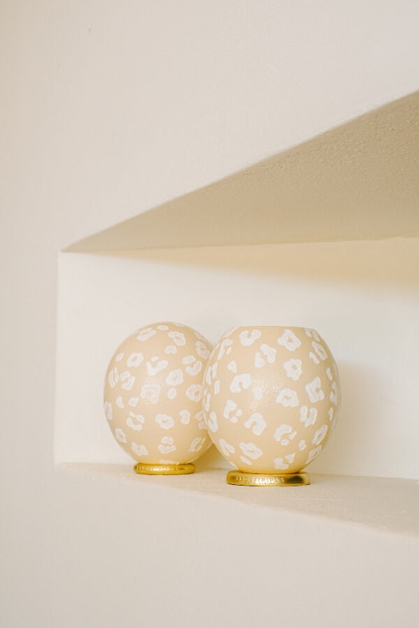 The Leopard Carved Ostrich Egg Ornament from Leo & Stripes