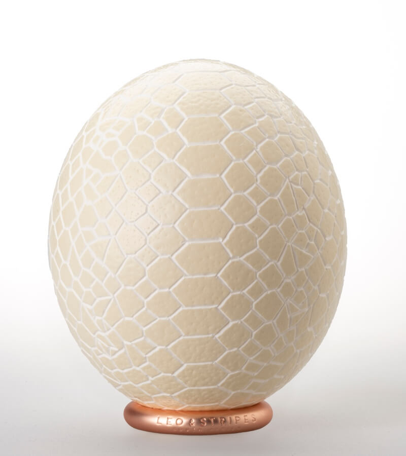 The Snake Carved Ostrich Egg Ornament from Leo & Stripe